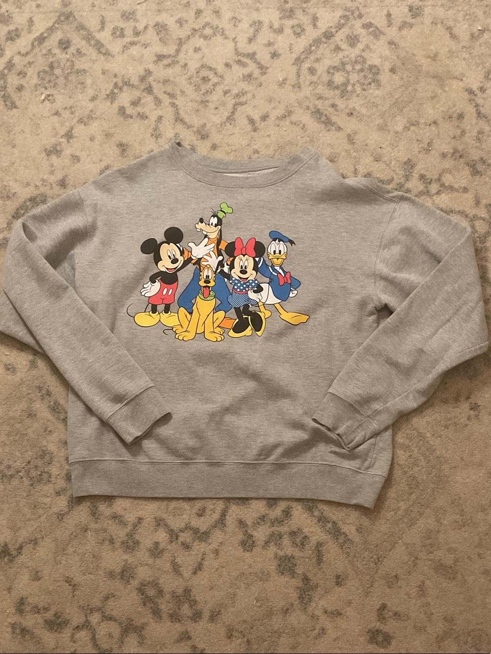 Disney gray sweatshirt with a graphic of Mickey Mouse and friends, size L
